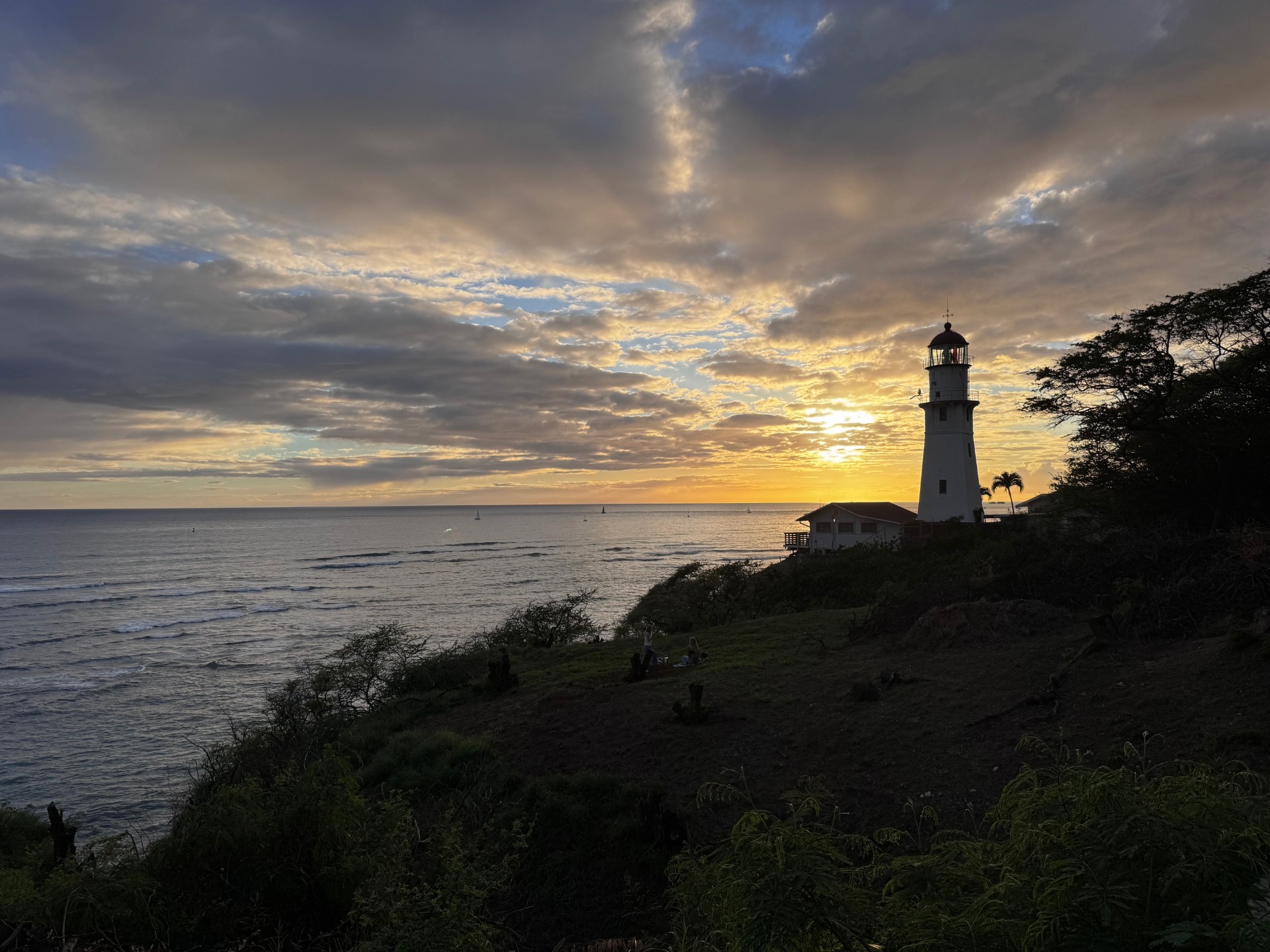 Diamond Head Lighthouse under Diamond Head Crater in Oahu, built in 1899, guiding ships to Honolulu Harbor.